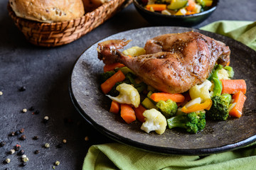 Roasted chicken leg with steamed vegetable