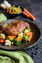 Roasted chicken leg with steamed vegetable