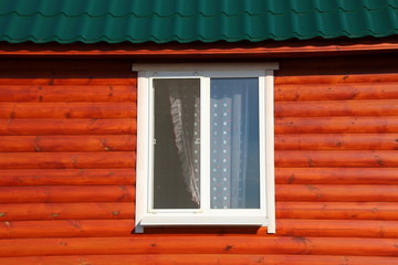 Plastic window of a modern summer cottage