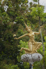 Obraz premium Lamp post angel statue