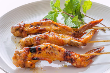 Braked Chicken.Food Thailand, led by chicken marinated with sauce and grilled on the barbecue.