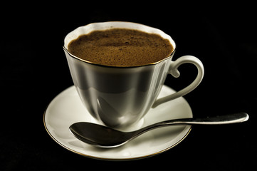 cup of coffee on a black background