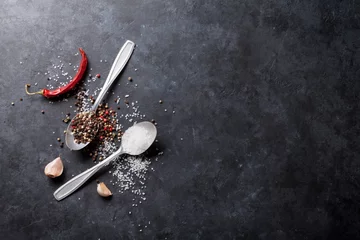 Keuken spatwand met foto Garlic, pepper and salt spices © karandaev