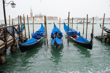 Fototapeta na wymiar Three gondolas in Venice on the Grand Canal, Italy.