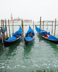 Fototapeta na wymiar Three gondolas in Venice on the Grand Canal, Italy.