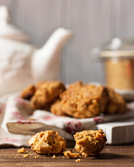 Caramel cookies with nuts, selective focus, vertical
