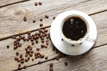 Cup of coffee on a grey wooden table