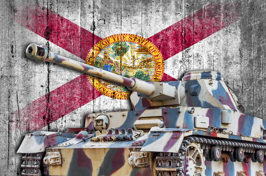 Military tank with concrete Florida flag