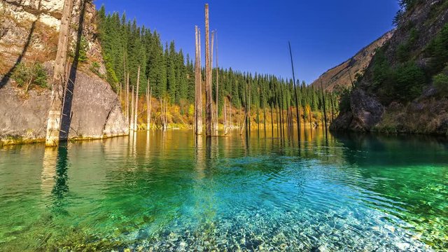 Kaindy Lake in autumn in mountains Kazakhstan. 4K TimeLapse - September 2016, Almaty and Astana, Kazakhstan