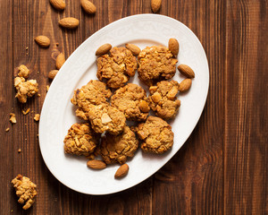 Caramel cookies with nuts, soft focus, horizontal, top view