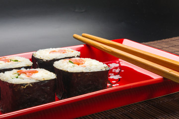 still life - set the rolls on a red plate