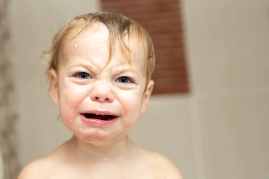 Child crying in bath