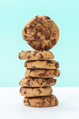 Fototapeta na wymiar chocolate chunk cookies on a bright blue background