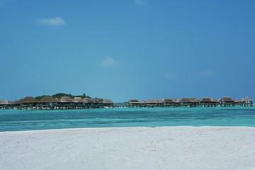 Over water bungalow with steps into amazing lagoon