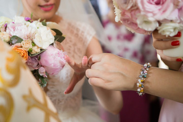 put the ring on her finger