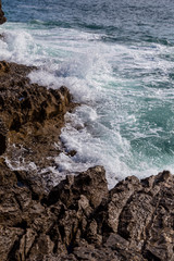 surf sea waves motion on rock