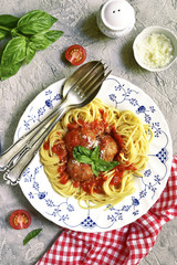 Meatballs in tomato sauce with spaghetti.Top view.