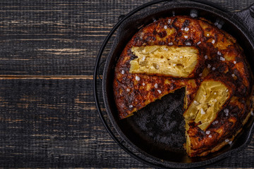 Spanish tortilla in a frying pan.