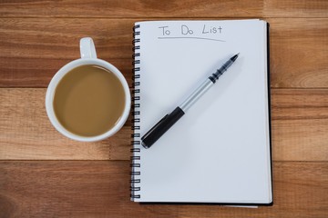 Cup of tea with diary and pen
