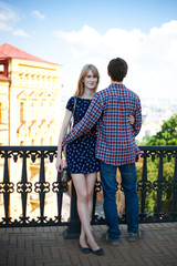 Young couple in love, hugging on the street