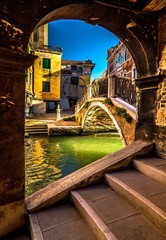 Italy beauty, one of many bridges on canal street in Venice , Venezia