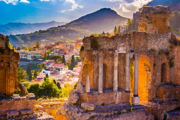 Wall murals Mediterranean Europe The Ruins of Taormina Theater at Sunset. Beautiful travel photo, colorful image of Sicily.