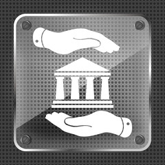 two hands with badge with bank icon on a mettalic background - v