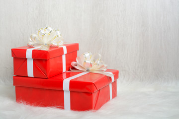 Two red boxes with gifts