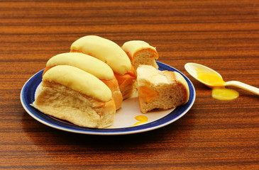 Iced buns with lemon filling.