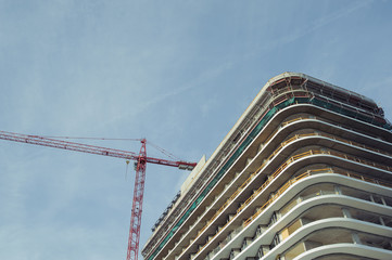 Construction site with crane and building