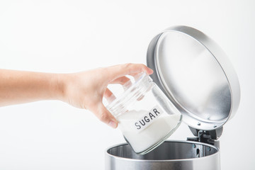 throwing away sugar in trashcan