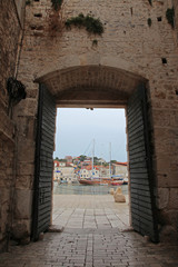 arched door to harbor