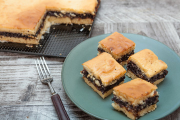 Homemade cake with jam and poppy seed