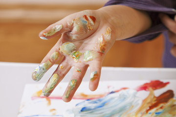 beautiful baby girl learning to draw