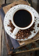 cup of coffee on wooden surface