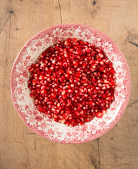 pomegranate seeds in a bowl