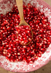 pomegranate seeds in a bowl