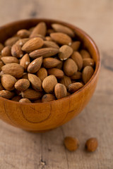 almonds on wooden surface