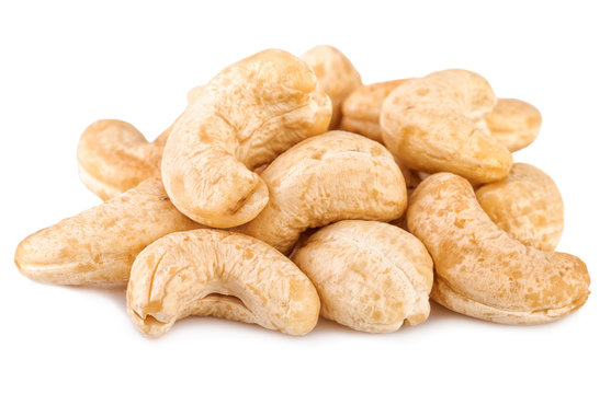 Cashew nuts on white. Cashew close-up