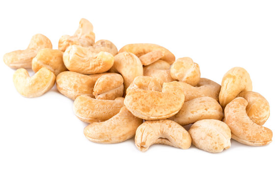 Cashew nuts heap handful on white