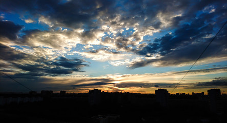 Cloudy urban sunset