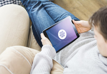 User Relaxing with Tablet Mockup 3