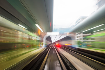 Fototapeta na wymiar Speed motion in urban highway road tunnel