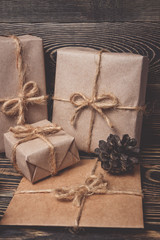 Fototapeta na wymiar Christmas gifts box presents on brown