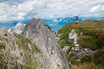 Travelers or hikers in the mountains in the National Park Trigla