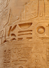 Ancient Egypt. The wall are decorated with carved hieroglyphs. Karnak Temple. Luxor. Thebes.