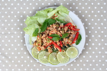 Home made,Spicy sour minced green mango salad with shrimp topped sliced green lemon,Chinese orange and lettuce. 