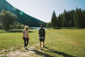 Couple of hipsters travelers on the nature.