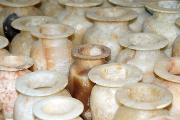 marble pitchers in the souvenir shop. photo toned.