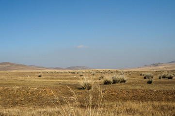 delicate haze of morning mist over the valley. hilly landscape. Savannah, grassland . used toning of the photo 